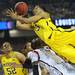 Michigan sophomore Trey Burke flies through the air as he is fouled during the second half of the national championship game at the Georgia Dome in Atlanta on Monday, April 8, 2013. Melanie Maxwell I AnnArbor.com
